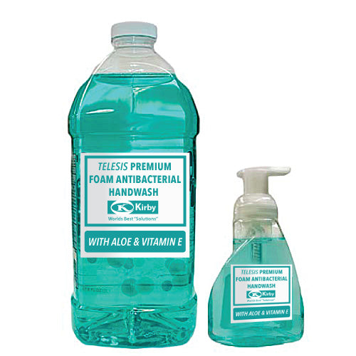 a bottle of soap next to a bottle of handwash